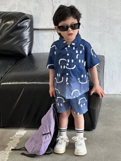 SHEIN Young Boy Smiling Face Printed Spring/Summer Outfit, Young Boy Denim Effect Short Sleeve Shirt And Shorts Casual 2pcs/Set