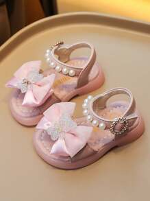 2026新款女童粉色蝴蝶结珍珠凉鞋，防滑软底，不吱吱作响，高评分公主鞋，适合夏季、上学和旅行的百搭儿童鞋 - 粉色 - 查看 2