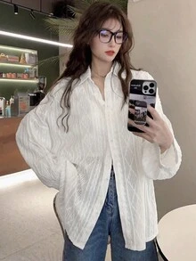 女士落肩长袖单排扣休闲宽松纯色纹理衬衫