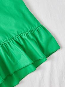 Soleia Combinaison verte décontractée pour femme avec ourlet à volants évidé et bretelles spaghetti pour les vacances
