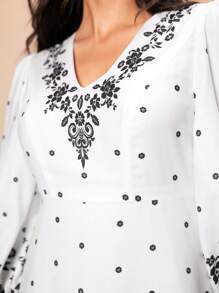 Mulvari Women's Printed Lantern Sleeve Dress With Fringe Hem And Flower Pattern