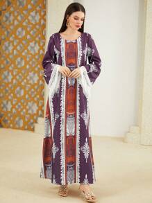 Al Najma Bohemian Print V-Neck Tassel-Trimmed Loose Dress