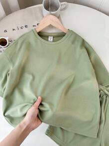 SHEIN LMoss Kids Conjunto de camiseta de cuello redondo de manga corta y pantalones cortos de unicolor tejidos para niña preadolescente para festival de música