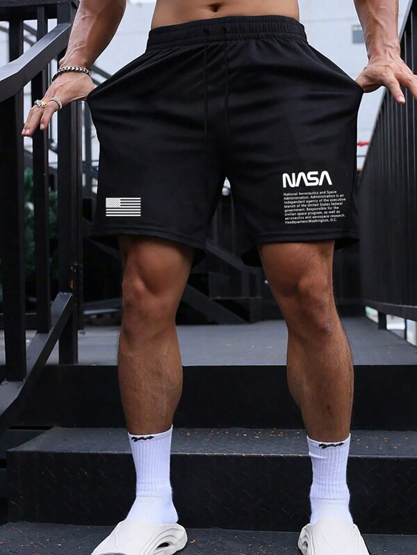 Manfinity LEGND Shorts negros de la cintura del cordón con impresión de eslogan de patrón de letra para hombres