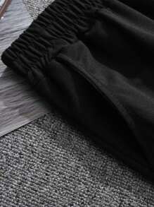 Manfinity LEGND Pantalones cortos con estampado de lema, cintura con cordón, patrón de letras negras, de vuelta al colegio