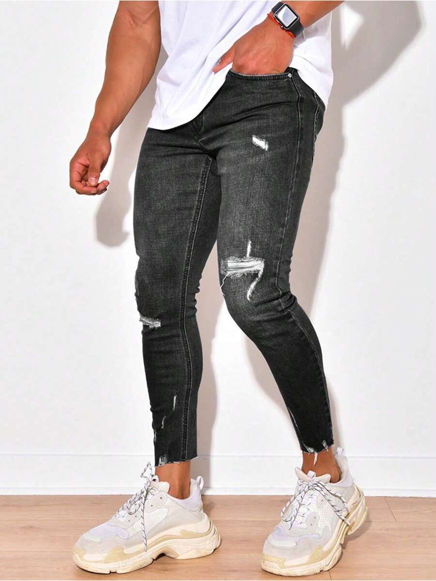 男士破洞毛边紧身牛仔裤，垃圾摇滚风