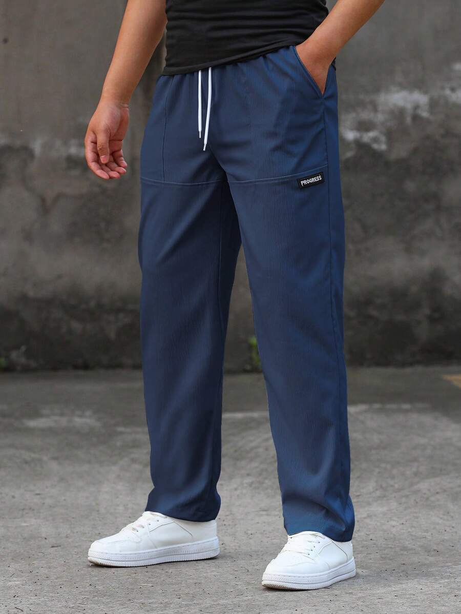 Manfinity Homme Pantalones rectos de corte holgado para hombre con parches con letras y cintura con cordón, para otoño - Azul Marino - Ver 1