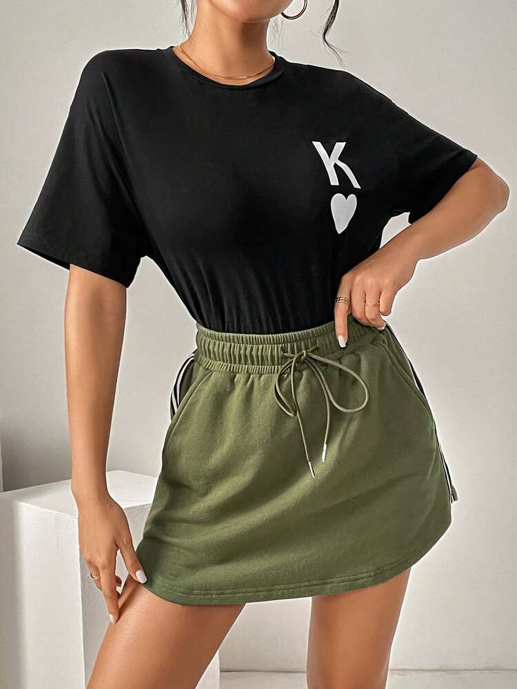 Women's Casual Style Loose Fit Chest Print Short Sleeve T-Shirt And Color Block Curved Hem Skirt With Slanted Pockets Set