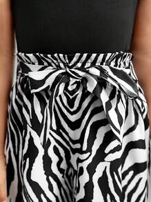 SHEIN Kleine Mädchen Für die Stadt optimiertes Set aus gestricktem Neckholder-Top und milchig gemusterten langen Hosen für Frühling/Sommer