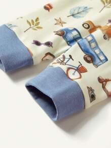 Cozy Pixies Baby Boy's Cartoon Car Pattern Color Block Short Sleeve Top And Footed Pants Snug Fit Pajama Set