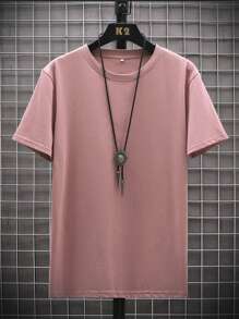 Manfinity Homme Camiseta casual de cuello redondo de unicolor para hombre, camiseta rosa para hombre, top rosa para hombre, camiseta lisa, camiseta color moca para hombre