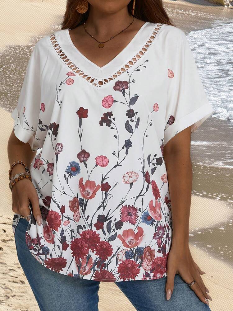 Plus Size Women's Belted Floral Print Jumpsuit With V-Neckline And Leaf Detailing