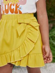 SHEIN Conjunto de top de manga corta de punto de cuello redondo con unicolor y falda asimétrica de volantes para niñas jóvenes, para primavera y verano