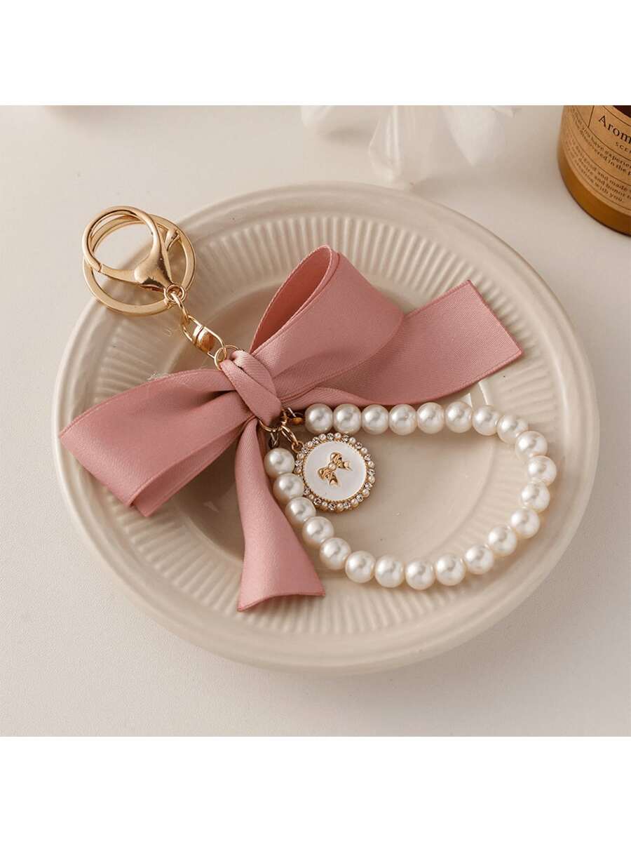 1 件大号蝴蝶结仿珍珠钥匙扣吊坠创意彩色丝带布结配饰耳机盒配饰送给女朋友的最佳礼物送给母亲的礼物教师节礼物生日礼物毕业礼物派对礼物可爱的东西蝴蝶结钥匙扣学校用品教师礼物返校用品教师配饰返校用品送给教师的礼物情人节 - 粉色 - 查看 1