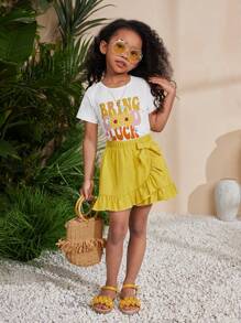 SHEIN Conjunto de top de manga corta de punto de cuello redondo con unicolor y falda asimétrica de volantes para niñas jóvenes, para primavera y verano