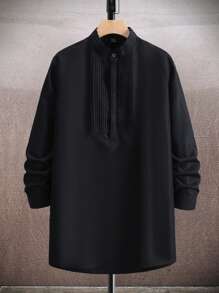 Manfinity Homme Camisa de manga larga con cuello alto y botones de unicolor para hombre, camisa casual negra lisa, otoño