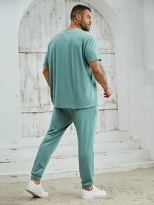 Manfinity Homme Große Größen 2-teiliges Set aus gestricktem, lässigem Kurzarm-T-Shirt und Jogginghose