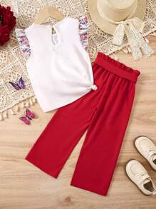 SHEIN Conjunto de 2 piezas con blusa de cuello redondo y estampado floral, y pantalones con cintura paper bag para niñas jóvenes - Multicolor - Ver 2