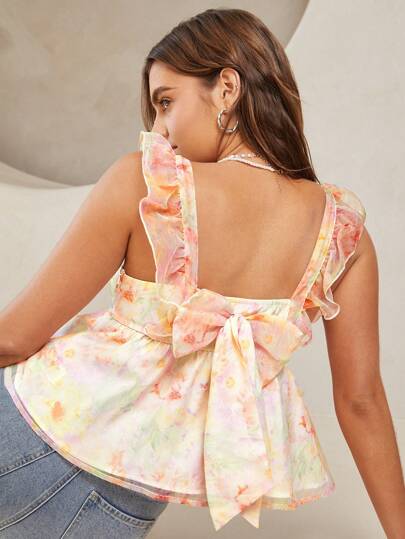 Soleia 女士浪漫鄉村風度假襯衫，採用色彩豐富的油畫花卉印花，褶邊下擺，蝴蝶結點綴，短袖和方領設計