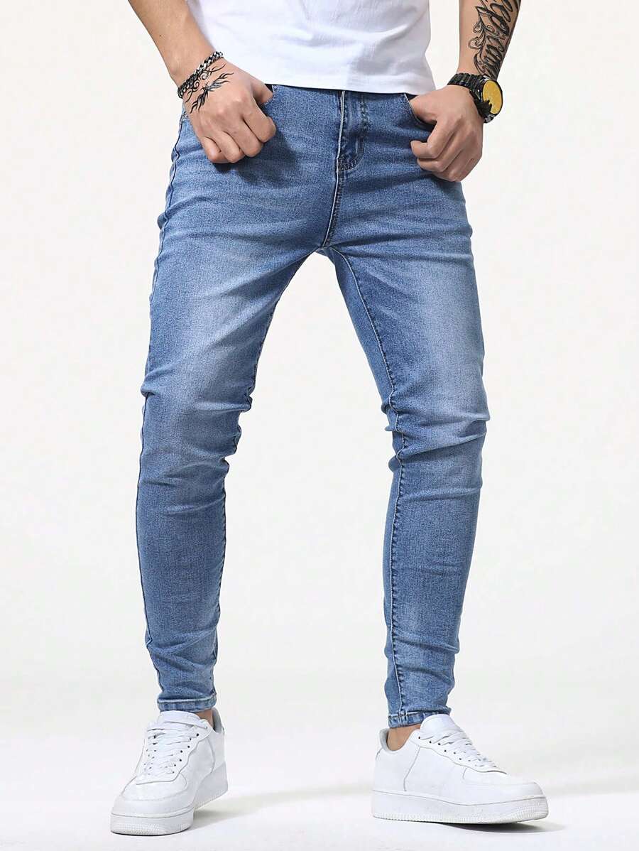 Manfinity Homme Jeans de hombre con lavado de bigotes de gato, de corte slim, de color azul claro lavado, para regalos de esposo o novio, jeans ajustados para hombres, jeans para hombres, jeans de corte slim - Lavado ligero - Ver 1
