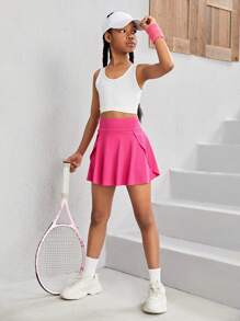 SHEIN Tween Mädchen Sportkleidung Set, Bestehend Aus Einfarbigem Westen Und Rock Mit U-förmigem Ausschnitt, Kreuzt Am Taillenbereich (mit Enganliegender Shorts, Um Das Herausblitzen Zu Verhindern)