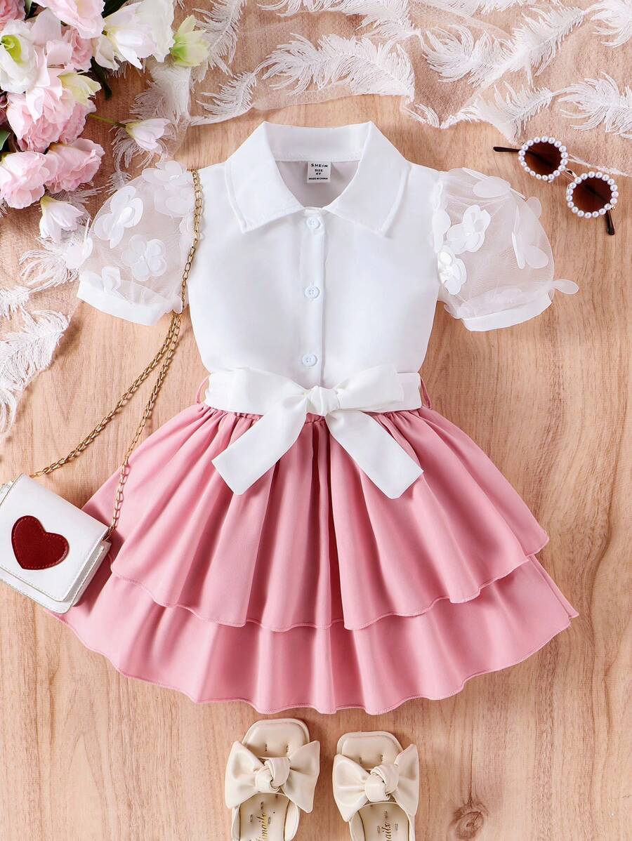 SHEIN طقم بأكمام وتنورة مكشوفة بطابع عتيق وربطة عنق مزينة بزهور لفتاة صغيرة بأسلوب جذاب وبسيط - وردي - مشاهدة 1