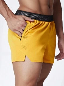 Manfinity 男友风男士拼色松紧腰侧开衩运动短裤，黄色短裤健身短裤慢跑短裤