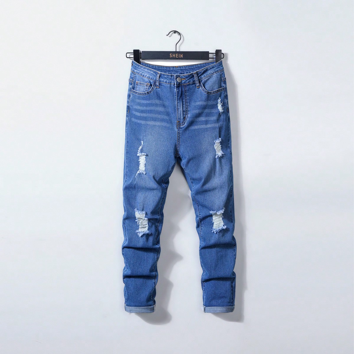 Jean déchiré bleu lavé à haute stretch pour garçon adolescent pour une tenue quotidienne de printemps et d'été