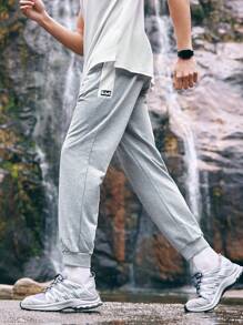 In My Nature Men's Spring Outdoor Joggers With Printed Letters, Elastic Waistband And Drawstring, Side Pockets And Elastic Cuffs