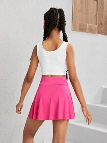 SHEIN Tween Mädchen Sportkleidung Set, Bestehend Aus Einfarbigem Westen Und Rock Mit U-förmigem Ausschnitt, Kreuzt Am Taillenbereich (mit Enganliegender Shorts, Um Das Herausblitzen Zu Verhindern)