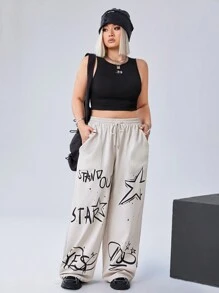 SHEIN EZwear CURVE 街頭風格塗鴉圖案印花寬鬆喇叭褲,適合大碼尺碼