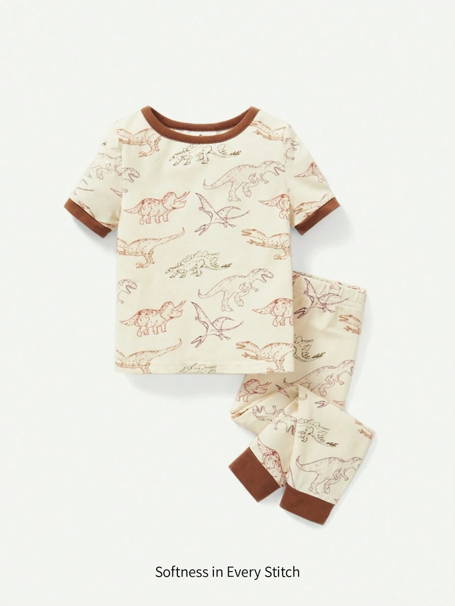 Cozy Pixies Bộ Pyjama vừa vặn cho bé trai với họa tiết khủng long hoạt hình, áo dài tay cổ tròn màu tương phản và quần có chân - Màu be - Xem 1