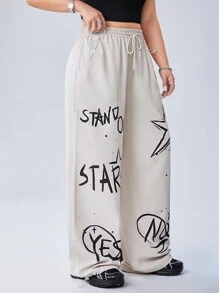SHEIN EZwear CURVE 街頭風格塗鴉圖案印花寬鬆喇叭褲,適合大碼尺碼