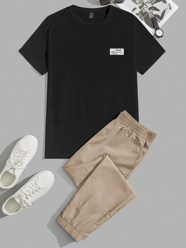 Manfinity Unisex Conjunto de verano para hombres de unicolor que incluye camiseta de manga corta y pantalones con puños elásticos, atuendos cómodos, cosas de pareja