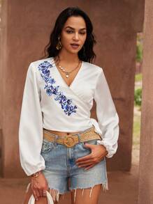 GENKIRA Áo cánh tay dài nữ in họa tiết in quấn nơ tay áo thun co giãn - Xanh và trắng - Xem 7