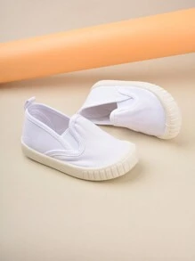 1對白色帆布彈力帶平底懶人鞋，流行時尚，舒適透氣，適合四季穿著