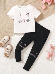 SHEIN Conjunto De Dos Piezas Para Niña Joven De Verano Informal, Con Estampado De Dibujos Animados, Con Camiseta De Manga Corta Y Pantalones. - Blanco - Ver 1