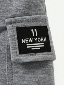 Cozy Pixies Shorts Décontractés Pour Bébé Garçon Avec Étiquette Tissée De Couleur De Bloc, Ceinture Élastique À Poches Latérales