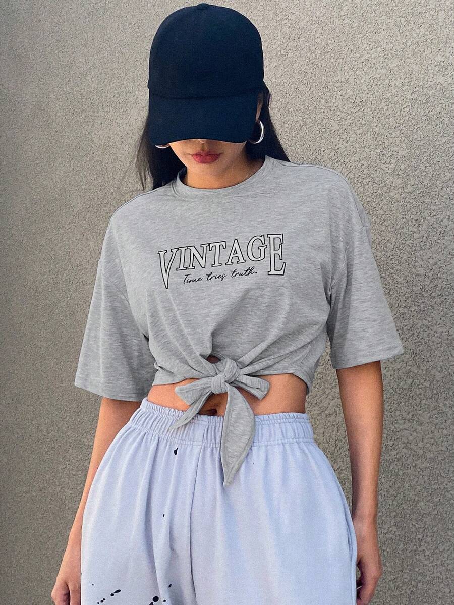 DAZY Loose Fit Cropped T-Shirt With Drop Shoulder, Knot Front Hem And Letter Print - Light Grey - View 1