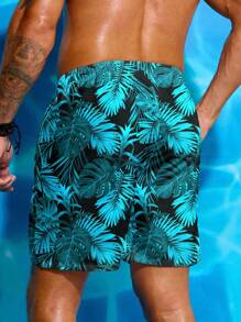 Manfinity VDAYZ Shorts de playa con estampado de hojas y cordón en la cintura para hombre, estilo hawaiano