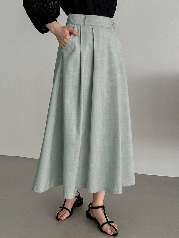 Mid length pleated skirts with pockets best sale