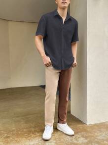 Manfinity Homme Camisa suelta de manga corta con textura y botones al frente para hombre