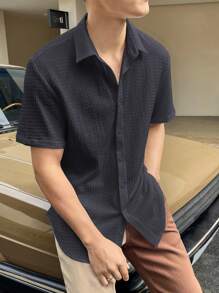 Manfinity Homme Camisa suelta de manga corta con textura y botones al frente para hombre