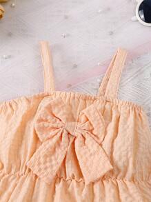 Enterizo con tirantes de decoración de patrón de mariposa en un unicolor para bebé (niña)