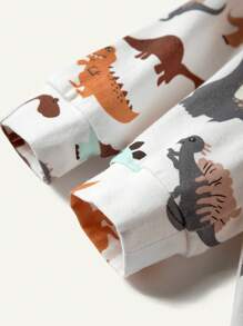 Cozy Pixies Set a juego de mameluco de manga larga sólido con diseño de dinosaurio y cuello redondo para niño recién nacido con pies