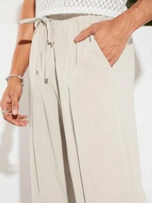 GENTILAND Nam Xuân Hè Xếp Ly Quần ống rộng hình củ cà rốt có túi xéo - Màu be - Xem 3