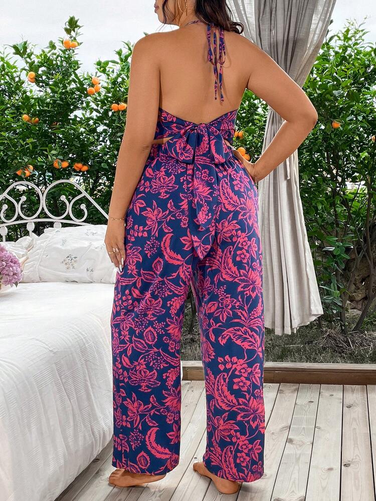 Plus Size Women Summer Vacation Style Floral Print Twist Knot Halter Neck Strap Romper With Cutout Detail