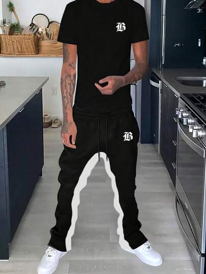 Manfinity Roghcode Camiseta masculina com decote redondo, mangas curtas e estampa de letra e calça de cintura com cordão em bloqueio de cor para o verão traje casual