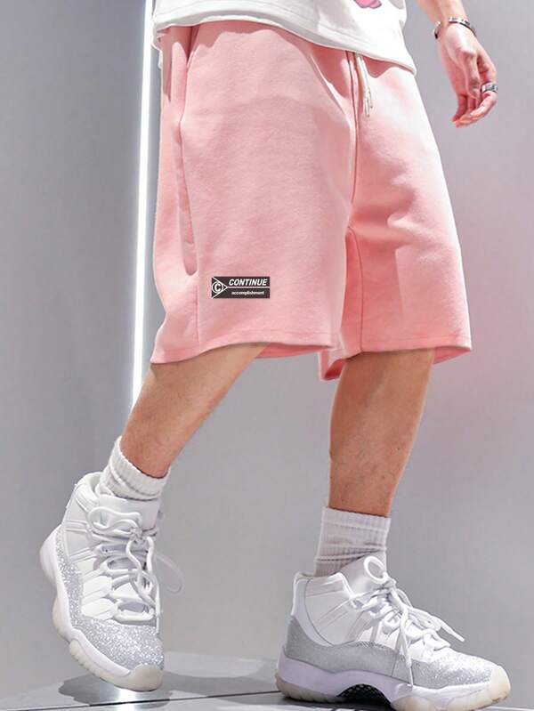 Manfinity Hypemode Shorts amples à la taille à cordon de serrage pour homme avec patchwork