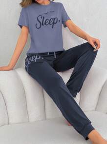 Conjunto de pijama de mangas cortas y pantalones largos impresos con pestañas y letras para primavera y verano